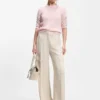 Sweater with open-knit sleeves
