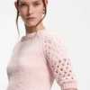 Sweater with open-knit sleeves