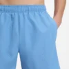 Swim shorts with all-over stacked logos