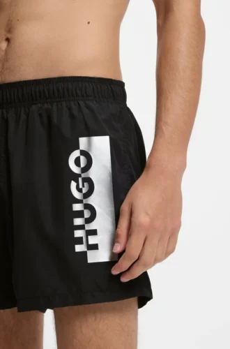 Swim shorts with metallic split logo