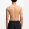 Swim shorts with repeated logos