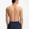 Swim shorts with repeated logos