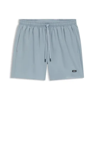 Swim shorts with rubber logo badge