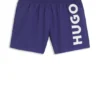 Swim shorts with vertical logo print