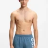 Swim shorts with vertical logo print