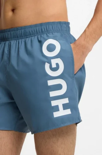 Swim shorts with vertical logo print