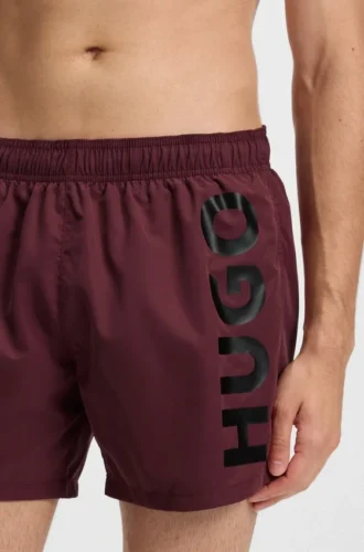 Swim shorts with vertical logo print