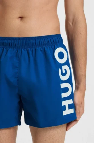 Swim shorts with vertical logo print