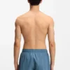 Swim shorts with vertical logo print