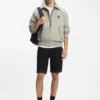 Tapered-fit shorts in black stretch denim Tapered-fit shorts in black stretch denim