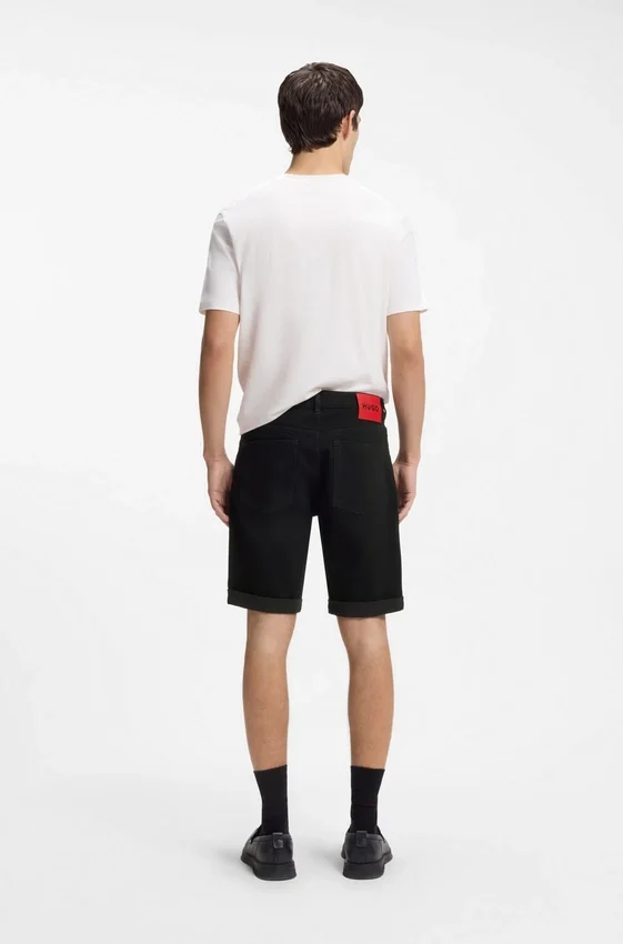 Tapered-fit shorts in black stretch denim Tapered-fit shorts in black stretch denim