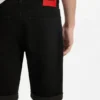 Tapered-fit shorts in black stretch denim Tapered-fit shorts in black stretch denim