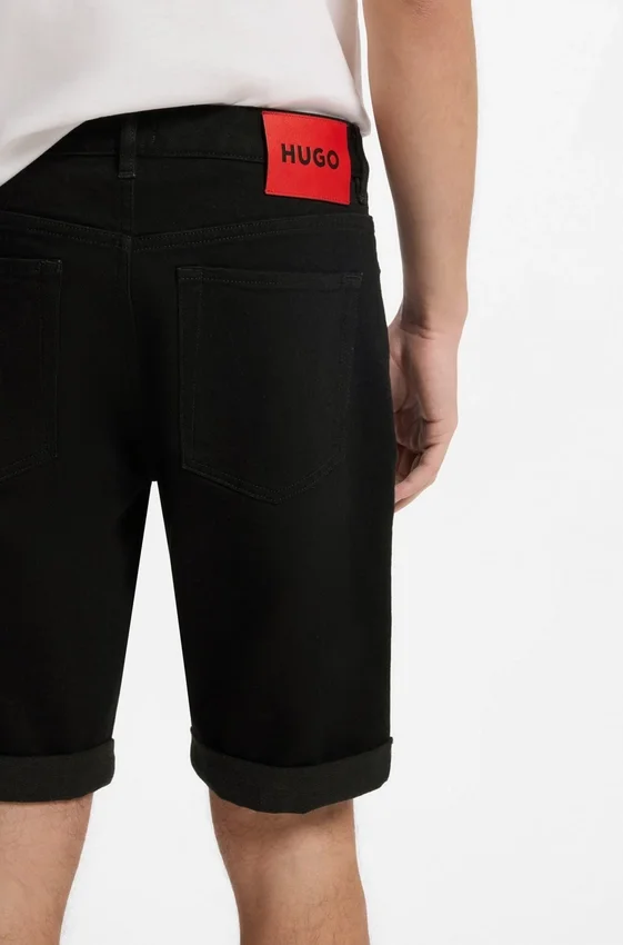 Tapered-fit shorts in black stretch denim Tapered-fit shorts in black stretch denim