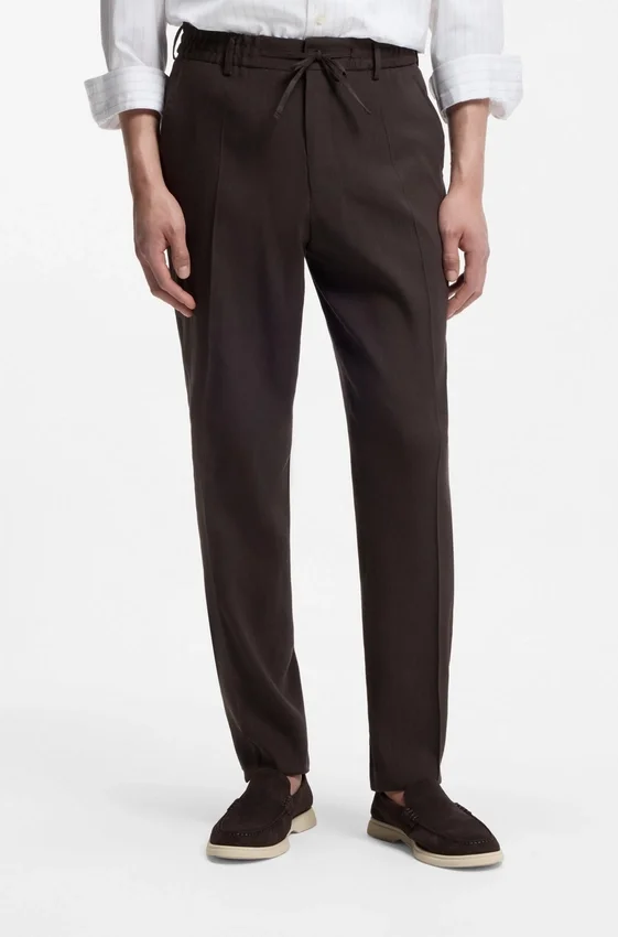 Tapered-fit trousers in a linen blend Tapered-fit trousers in a linen blend