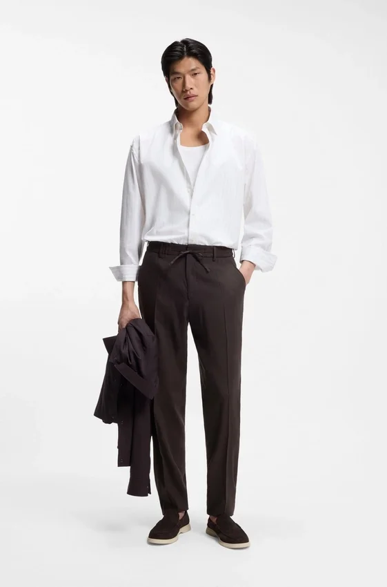 Tapered-fit trousers in a linen blend Tapered-fit trousers in a linen blend