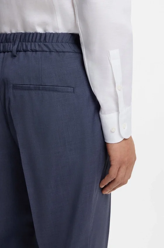 Tapered-fit trousers in washable virgin wool Tapered-fit trousers in washable virgin wool