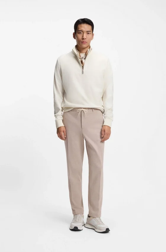Tapered-fit trousers with reversible drawstring Tapered-fit trousers with reversible drawstring