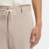 Tapered-fit trousers with reversible drawstring Tapered-fit trousers with reversible drawstring