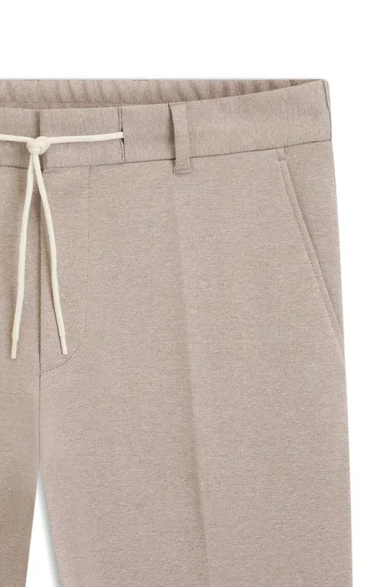 Tapered-fit trousers with reversible drawstring Tapered-fit trousers with reversible drawstring