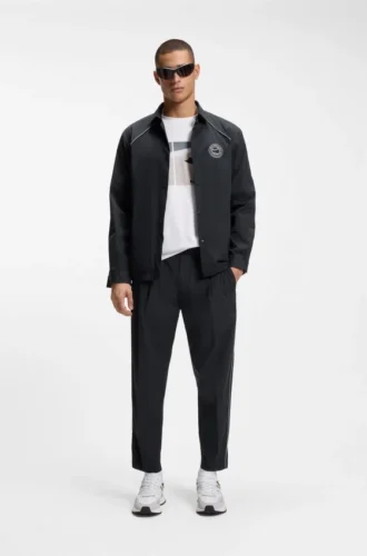 Tapered-fit trousers with water-repellent finish