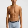 Three-pack of logo-waistband trunks in stretch cotton