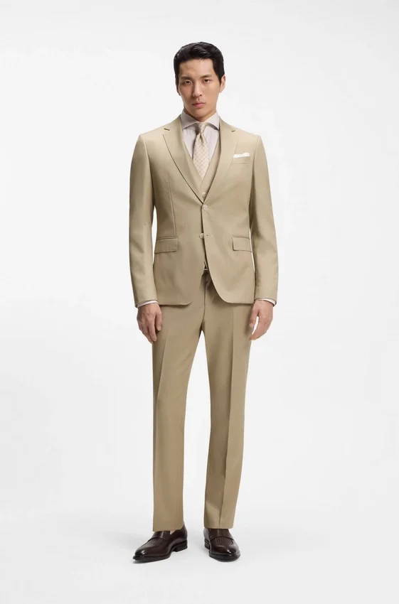 Three-piece slim-fit suit in virgin-wool serge Three-piece slim-fit suit in virgin-wool serge