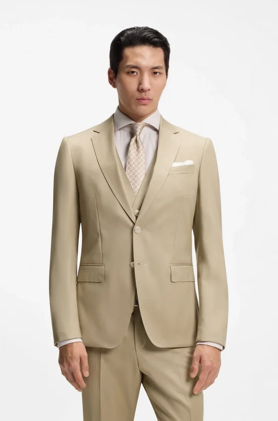 Three-piece slim-fit suit in virgin-wool serge Three-piece slim-fit suit in virgin-wool serge