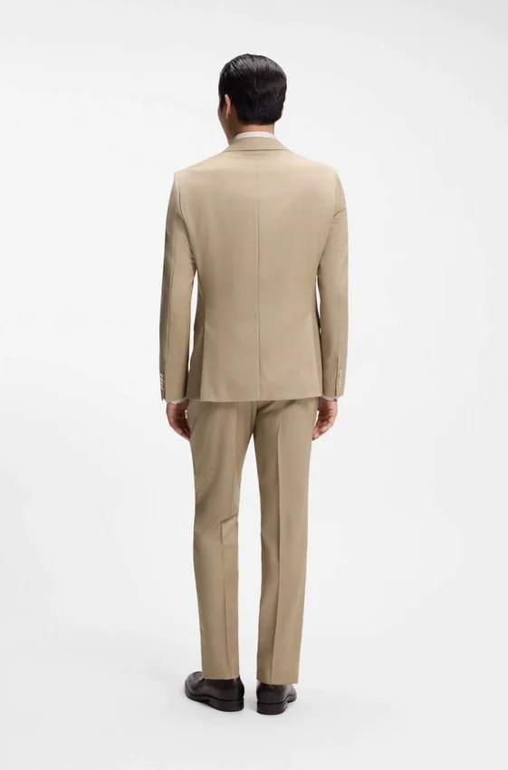 Three-piece slim-fit suit in virgin-wool serge Three-piece slim-fit suit in virgin-wool serge