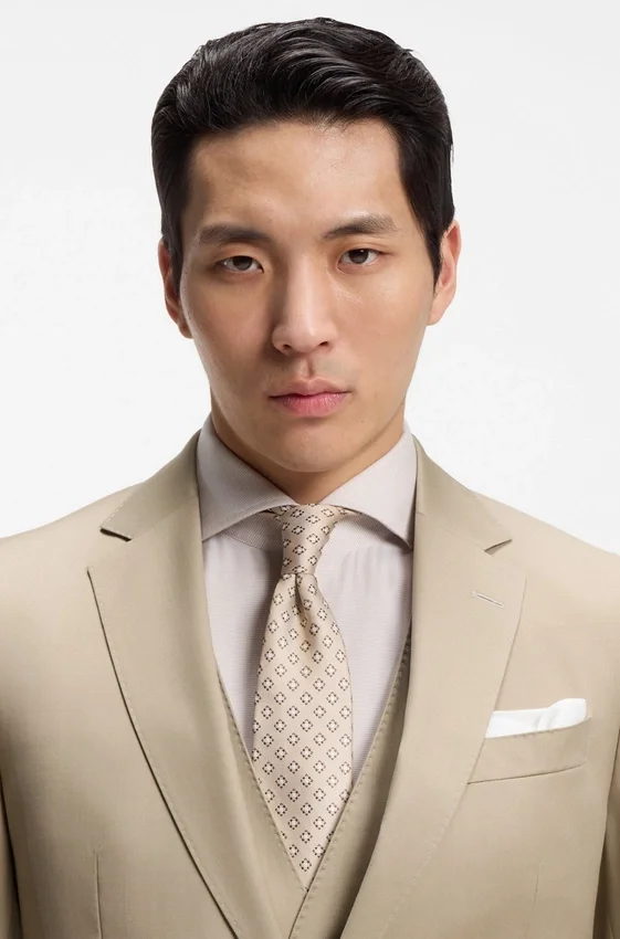 Three-piece slim-fit suit in virgin-wool serge Three-piece slim-fit suit in virgin-wool serge