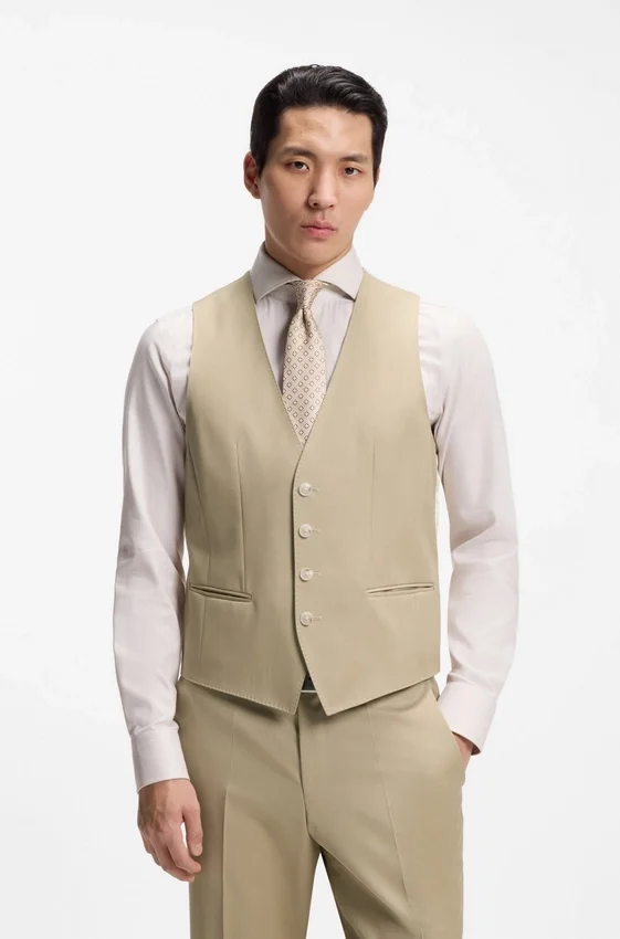 Three-piece slim-fit suit in virgin-wool serge Three-piece slim-fit suit in virgin-wool serge
