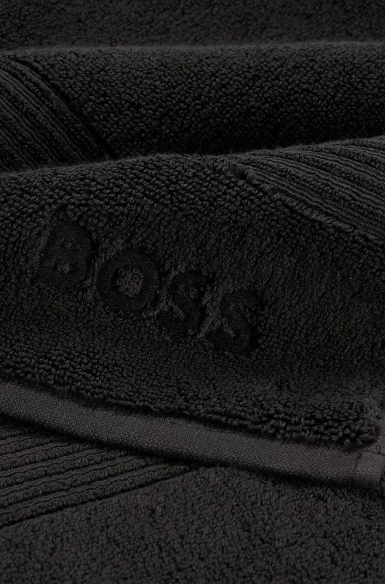 Tonal-logo black bath towel in Aegean cotton Tonal-logo black bath towel in Aegean cotton
