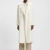 Trench coat with fabric belt
