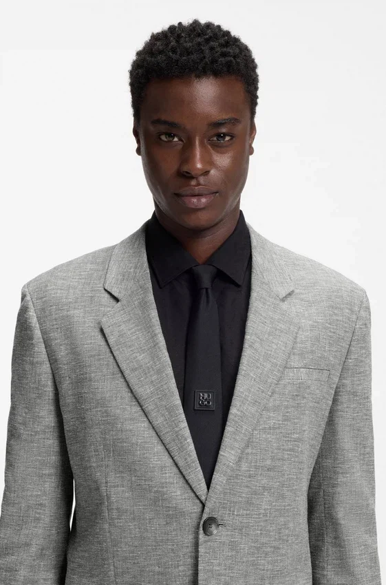 Two-piece modern-fit suit in sharkskin fabric Two-piece modern-fit suit in sharkskin fabric