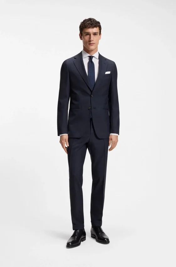 Two-piece slim-fit suit in checked virgin wool Two-piece slim-fit suit in checked virgin wool