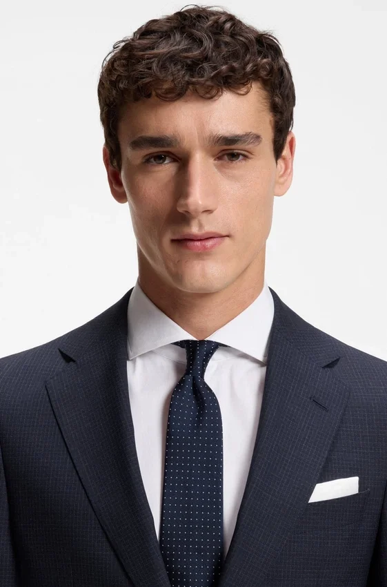 Two-piece slim-fit suit in checked virgin wool Two-piece slim-fit suit in checked virgin wool