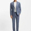 Two-piece slim-fit suit in cotton and virgin wool Two-piece slim-fit suit in cotton and virgin wool