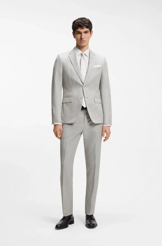 Two-piece slim-fit suit in cotton and virgin wool Two-piece slim-fit suit in cotton and virgin wool