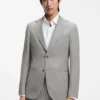 Two-piece slim-fit suit in cotton and virgin wool Two-piece slim-fit suit in cotton and virgin wool
