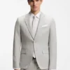 Two-piece slim-fit suit in cotton and virgin wool Two-piece slim-fit suit in cotton and virgin wool