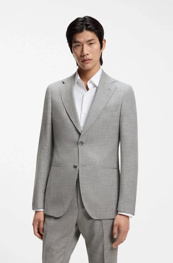 Two-piece slim-fit suit in cotton and virgin wool Two-piece slim-fit suit in cotton and virgin wool