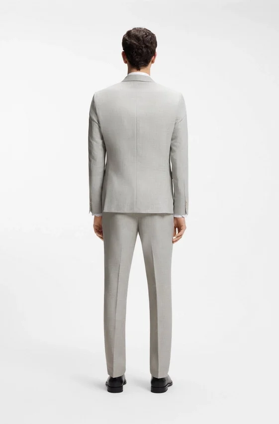Two-piece slim-fit suit in cotton and virgin wool Two-piece slim-fit suit in cotton and virgin wool