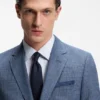 Two-piece slim-fit suit in cotton and virgin wool Two-piece slim-fit suit in cotton and virgin wool