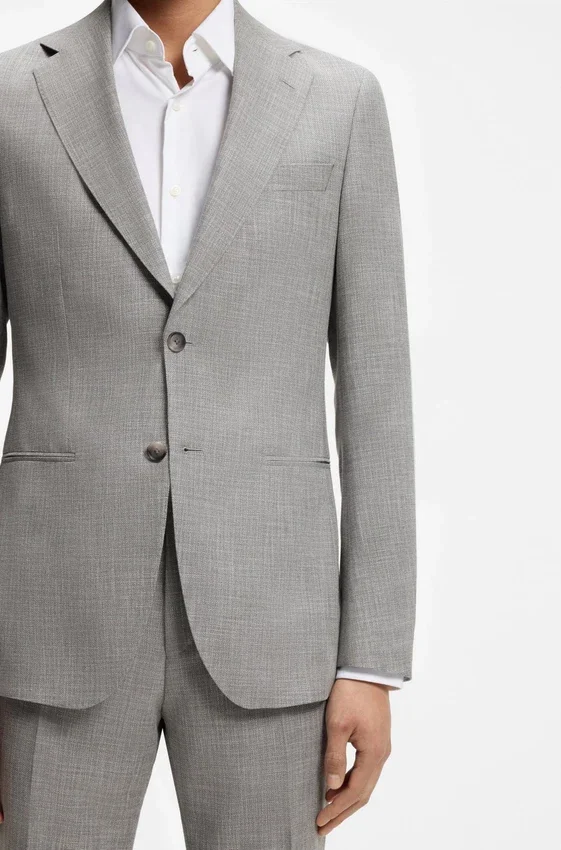 Two-piece slim-fit suit in cotton and virgin wool Two-piece slim-fit suit in cotton and virgin wool