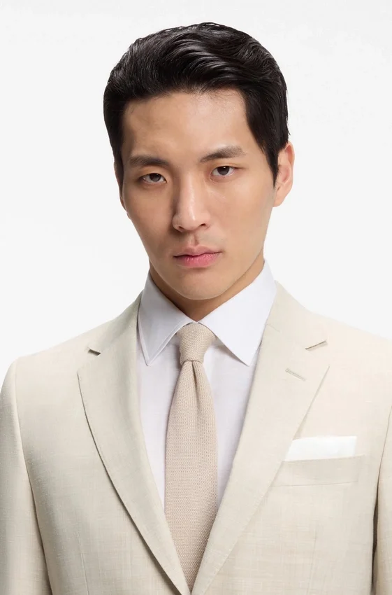 Two-piece slim-fit suit in micro-patterned cloth Two-piece slim-fit suit in micro-patterned cloth