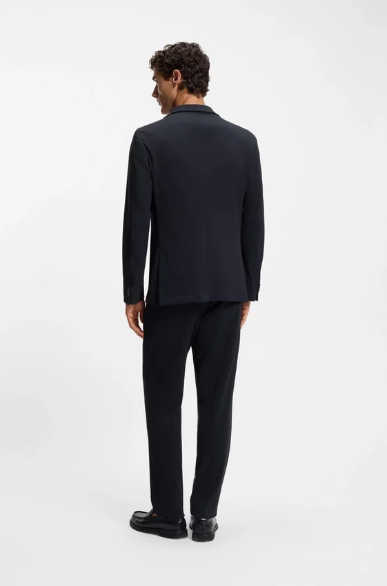 Two-piece slim-fit suit in performance-stretch fabric Two-piece slim-fit suit in performance-stretch fabric