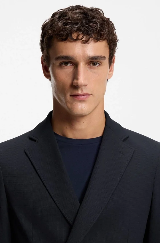 Two-piece slim-fit suit in performance-stretch fabric Two-piece slim-fit suit in performance-stretch fabric