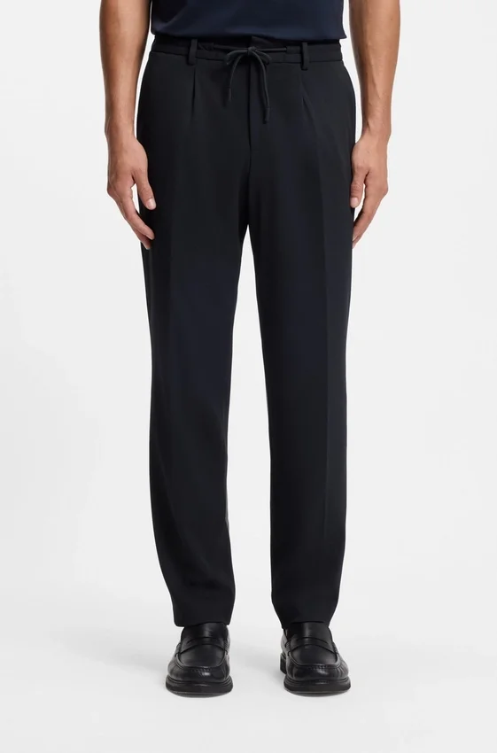 Two-piece slim-fit suit in performance-stretch fabric Two-piece slim-fit suit in performance-stretch fabric