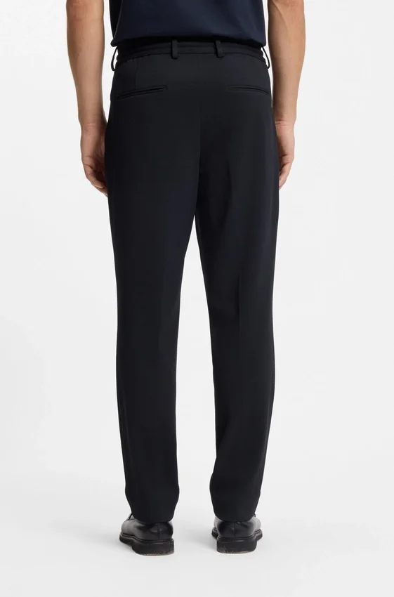 Two-piece slim-fit suit in performance-stretch fabric Two-piece slim-fit suit in performance-stretch fabric