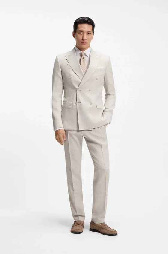 Two-piece slim-fit suit in striped linen and wool Two-piece slim-fit suit in striped linen and wool
