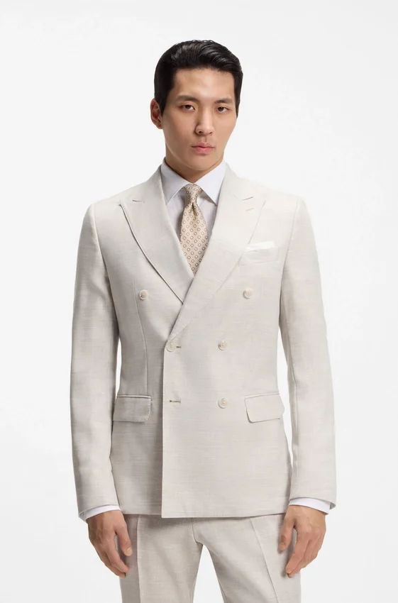 Two-piece slim-fit suit in striped linen and wool Two-piece slim-fit suit in striped linen and wool